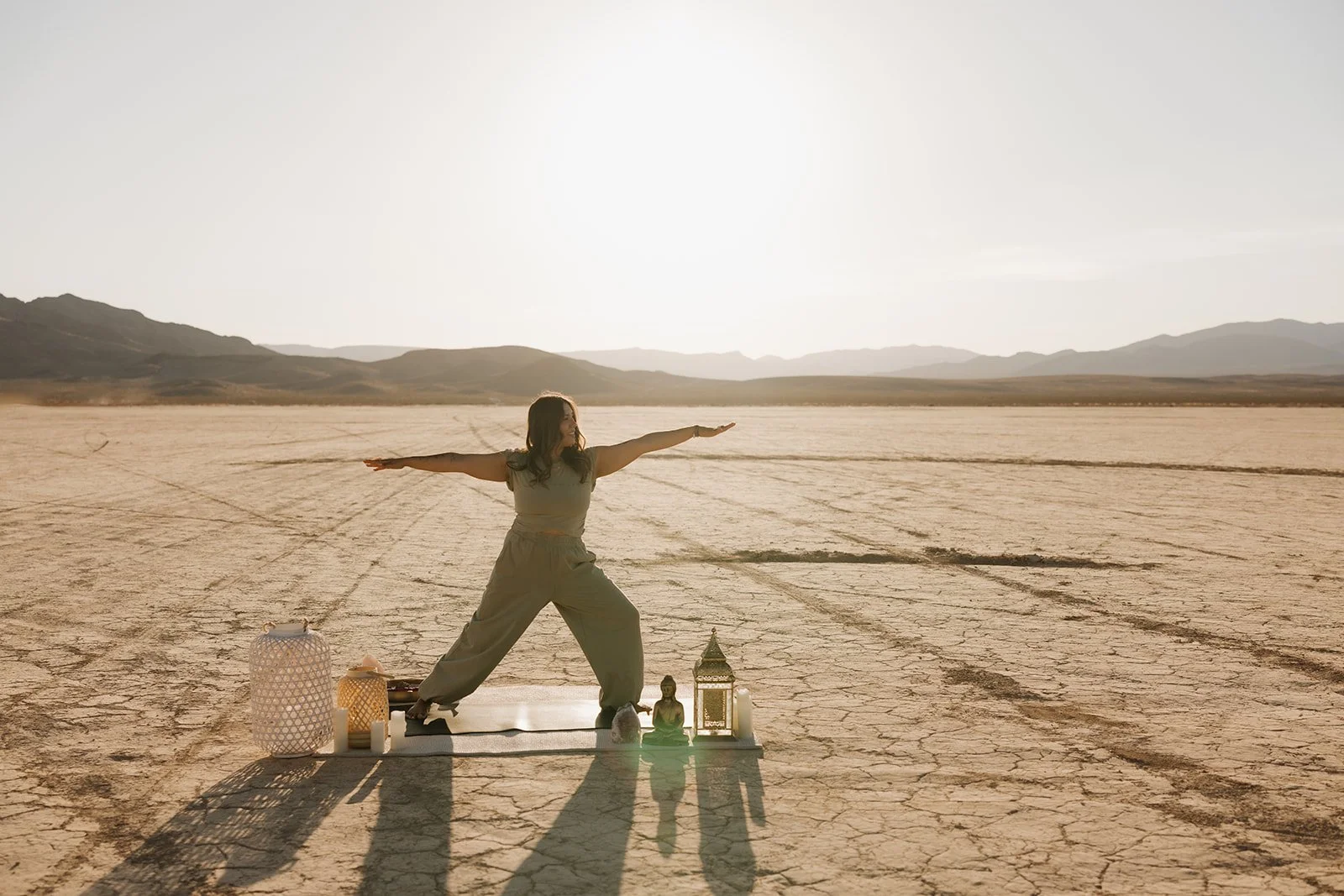 Trauma therapist practicing yoga in the Nevada desert, representing balance, mindfulness, flexibility, and healing through the Buddhist Middle Way.