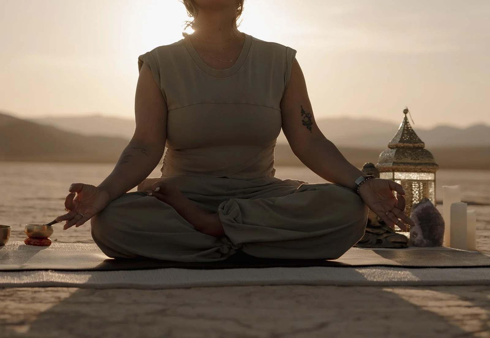 Trauma therapist practicing mindfulness and meditation in the Nevada desert, representing emotional balance, healing, and the Buddhist Middle Way.