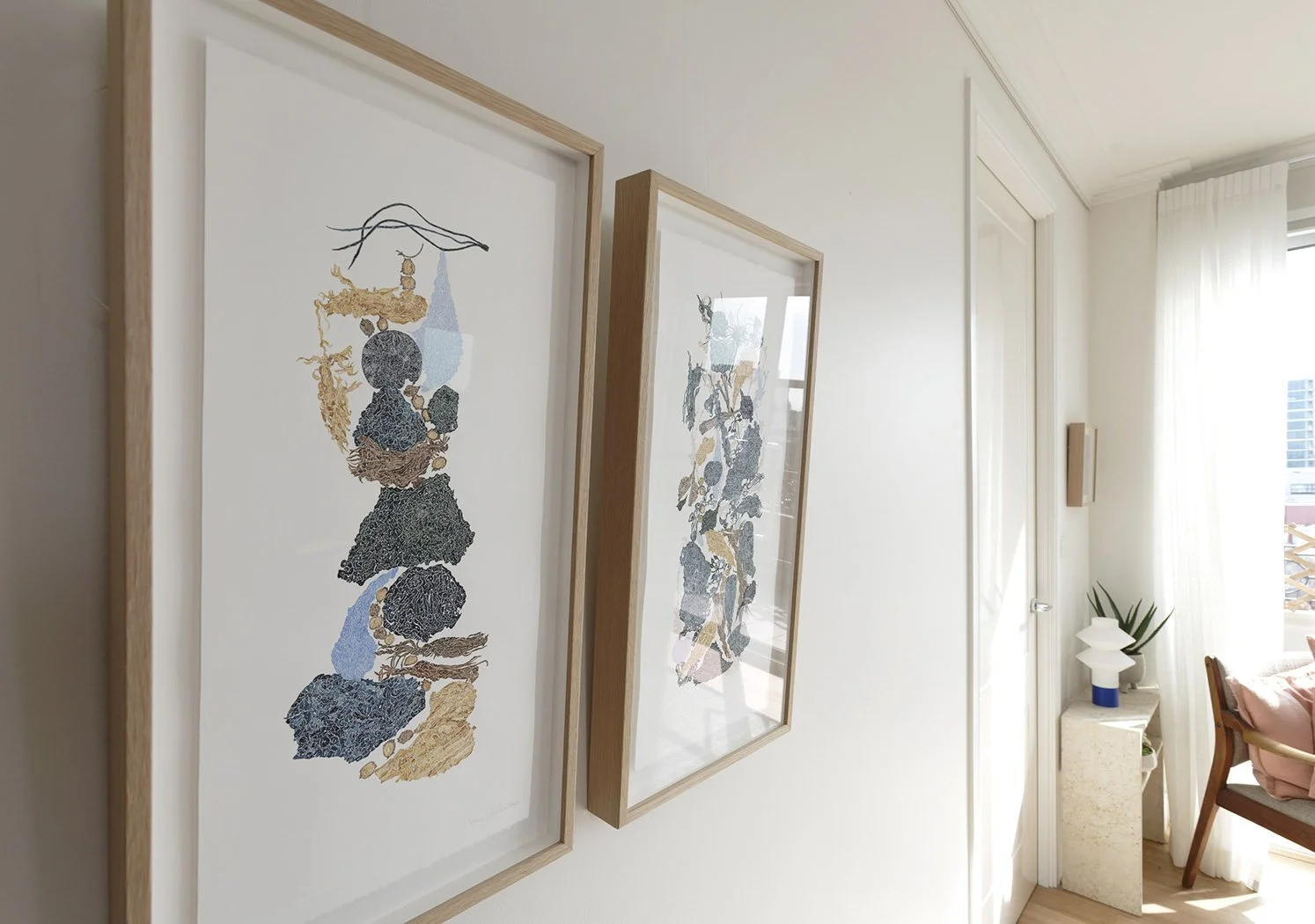 Clare Bell's seeking inspiration works framed and hung in a light-filled room