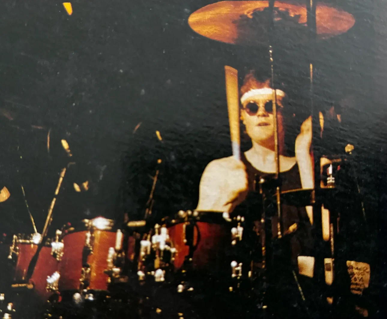 Brad Heanet behind the drum kit playing with The Radiators.