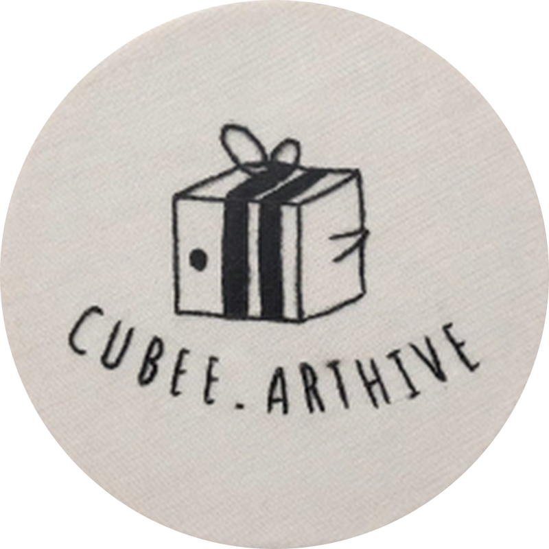 Illustration of a wrapped gift box with a bow and the text “Cubee-Arthine.”