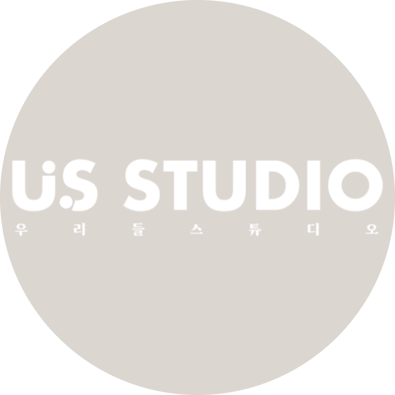 Circular U.S. Studio logo with Korean text underneath