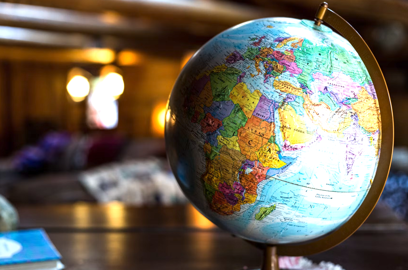 A globe showing Africa, parts of Europe, and the Middle East with colorful political boundaries.