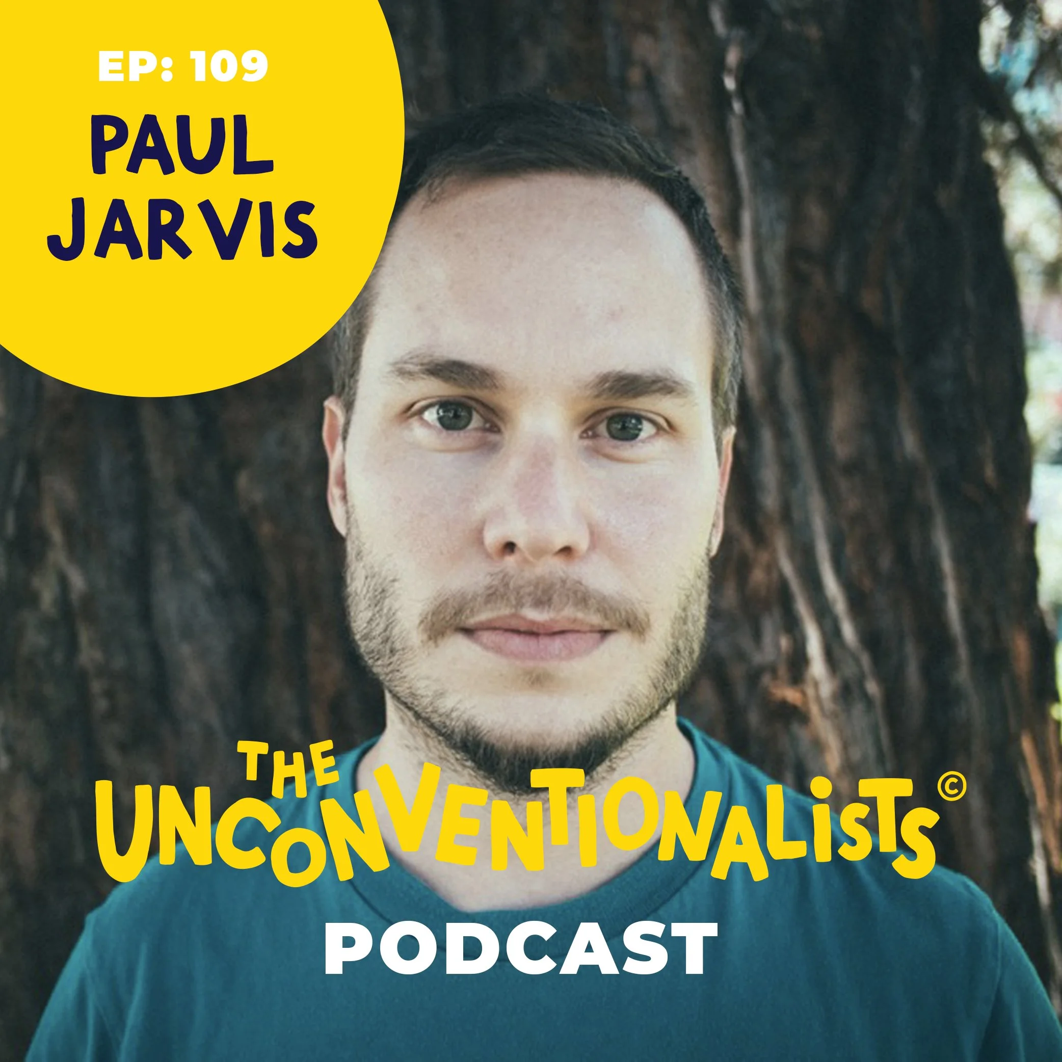 Close-up of a man with brown hair and green eyes, wearing a blue shirt, standing outdoors near a tree, with yellow and blue text overlaid that promotes a podcast episode titled 'EP: 109 Paul Jarvis The Unconventionalist Podcast'.
