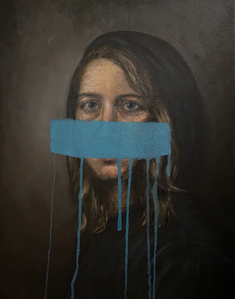A portrait of a woman with long hair and blue eyes, her mouth covered with a horizontal blue paint streak that drips down.