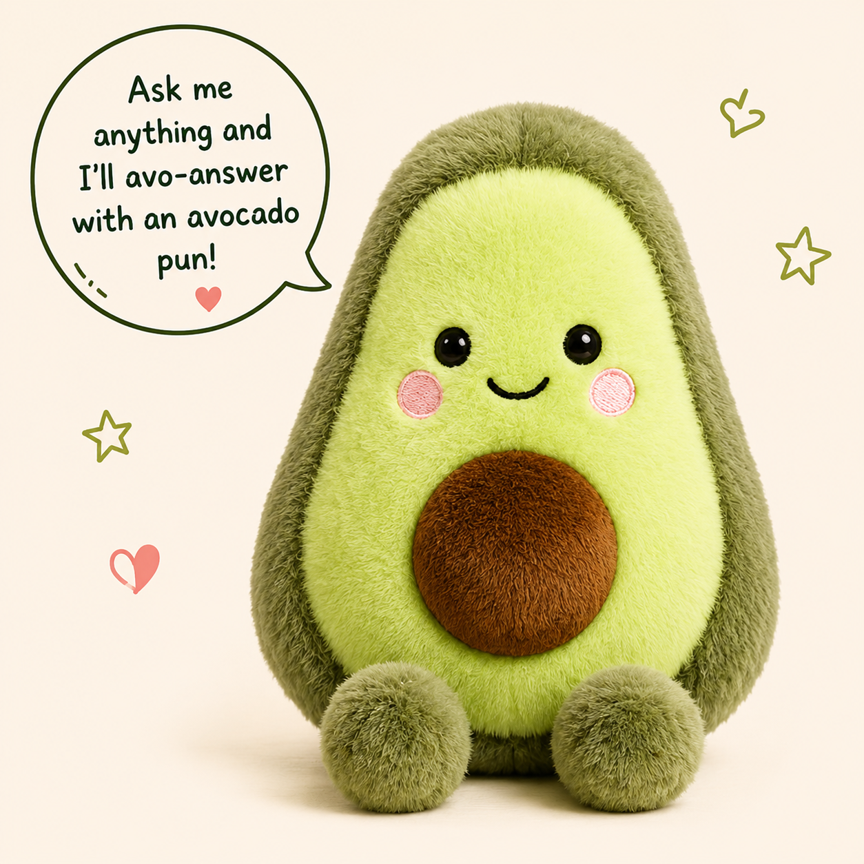 A plush toy in the shape of an avocado with a smiling face, decorated with embroidered cheeks and eyes. The toy has a brown seed and green outer and inner parts. There are small doodles around it, including stars, hearts, and a speech bubble that says, 'Ask me anything and I'll avo-answer with an avocado pun!'.