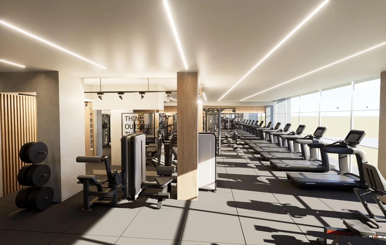 Ginásio com esteiras de corrida e equipamentos de musculação, iluminação moderna e janelas grandes com vista para o exterior.