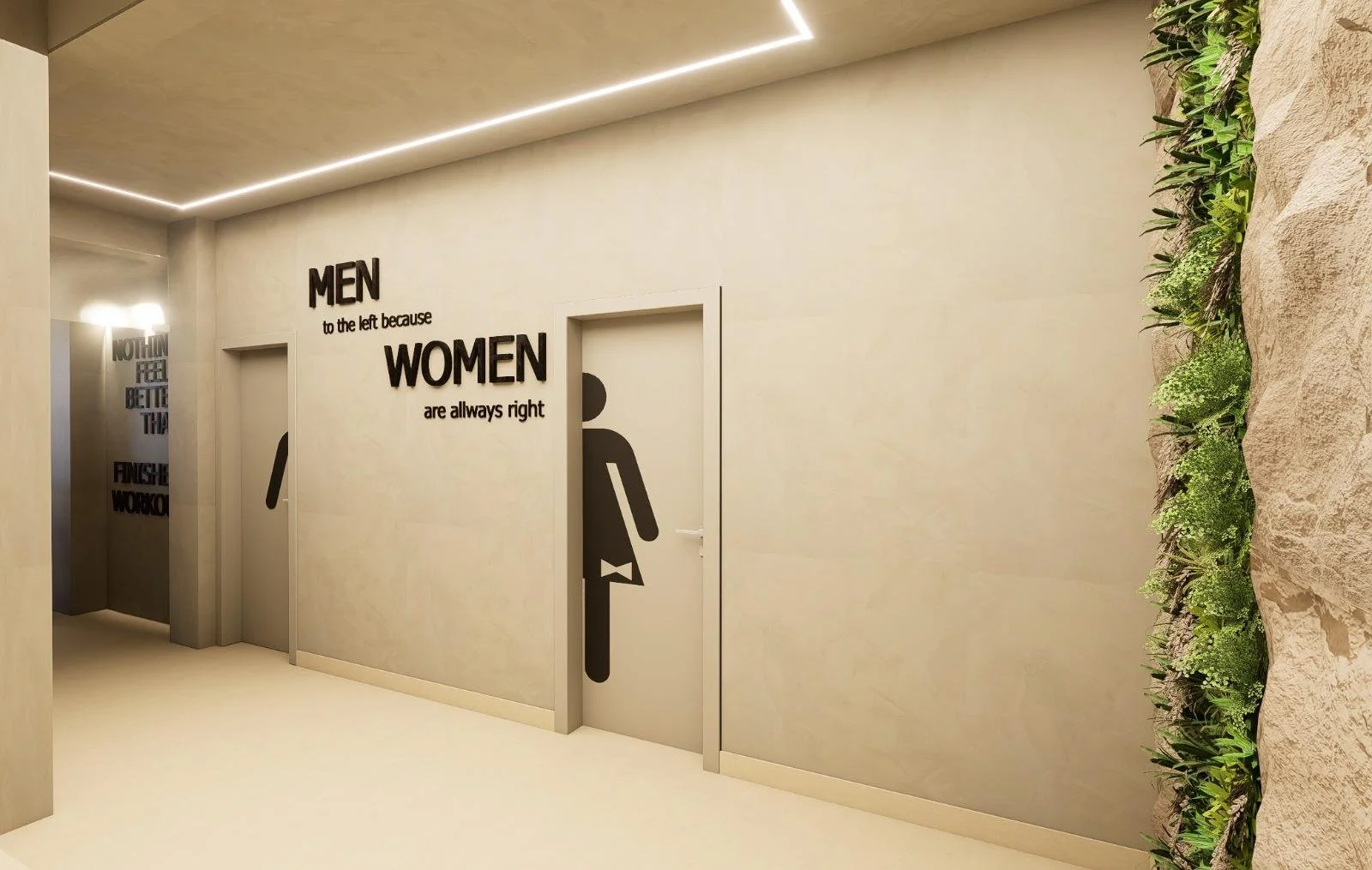 Corredor com sinais de banheiros masculinos e femininos, com uma parede de vegetação ao lado.