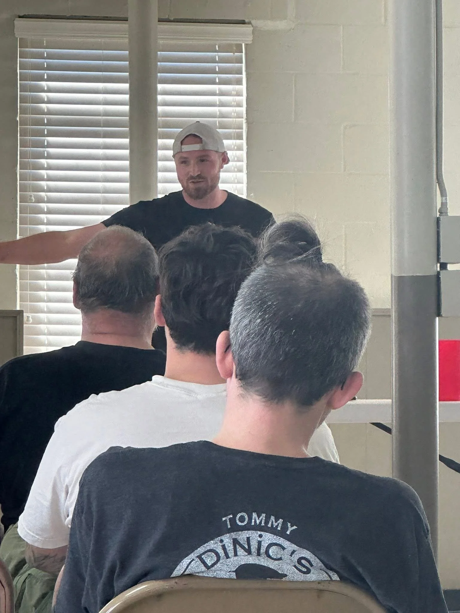 Brother Caleb Shuford giving the word to a group of men seeking further discipleship and understanding of being a son of God and a brother in the family of God. Pentecostal meeting of Christian men. Brother Caleb Preaching Sermons