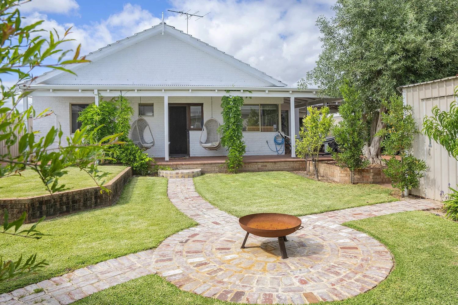 The front garden with a fire pit