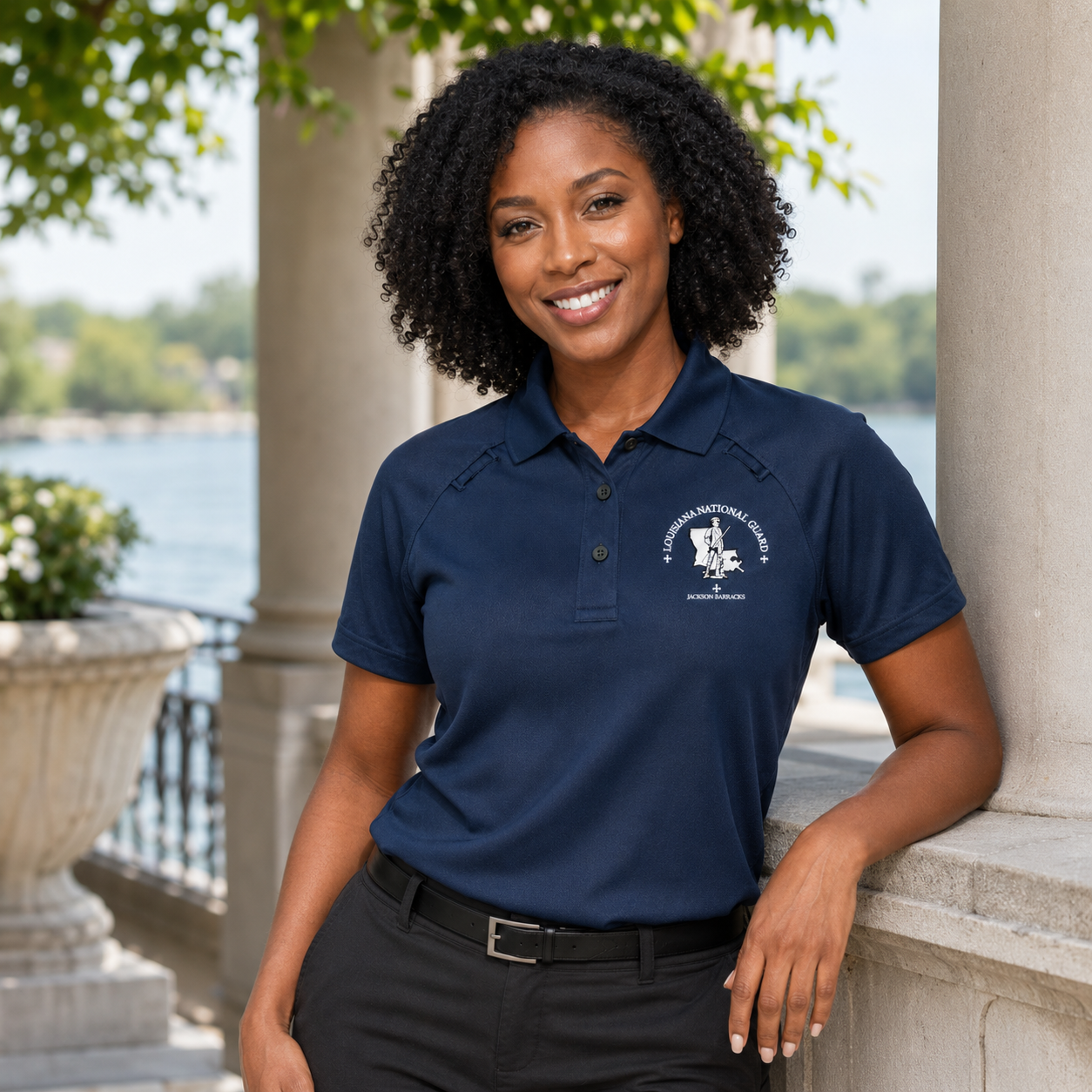 Woman wearing a navy tactical with the Jackson Barracks logo on it - Jackson Barracks Post Exchange