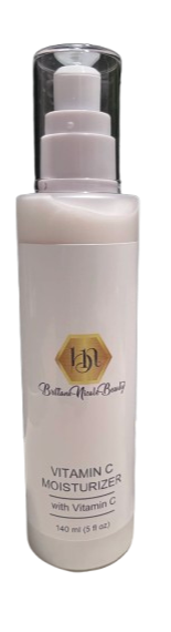 White bottle of Vitamin C moisturizer with pump dispenser, branded as 'Brown Natural Beauty,' 140 ml