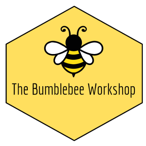 A yellow hexagon logo featuring a cartoon bee at the top and the text 'The Bumblebee Workshop' beneath it.