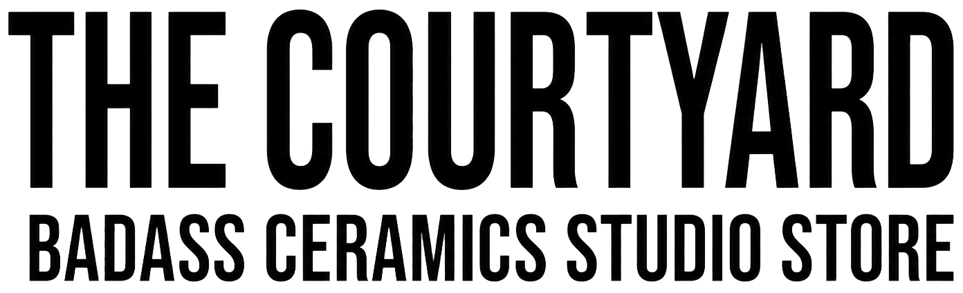 Text in black and white reading 'The Couch Yard Badass Ceramics Studio Store'.