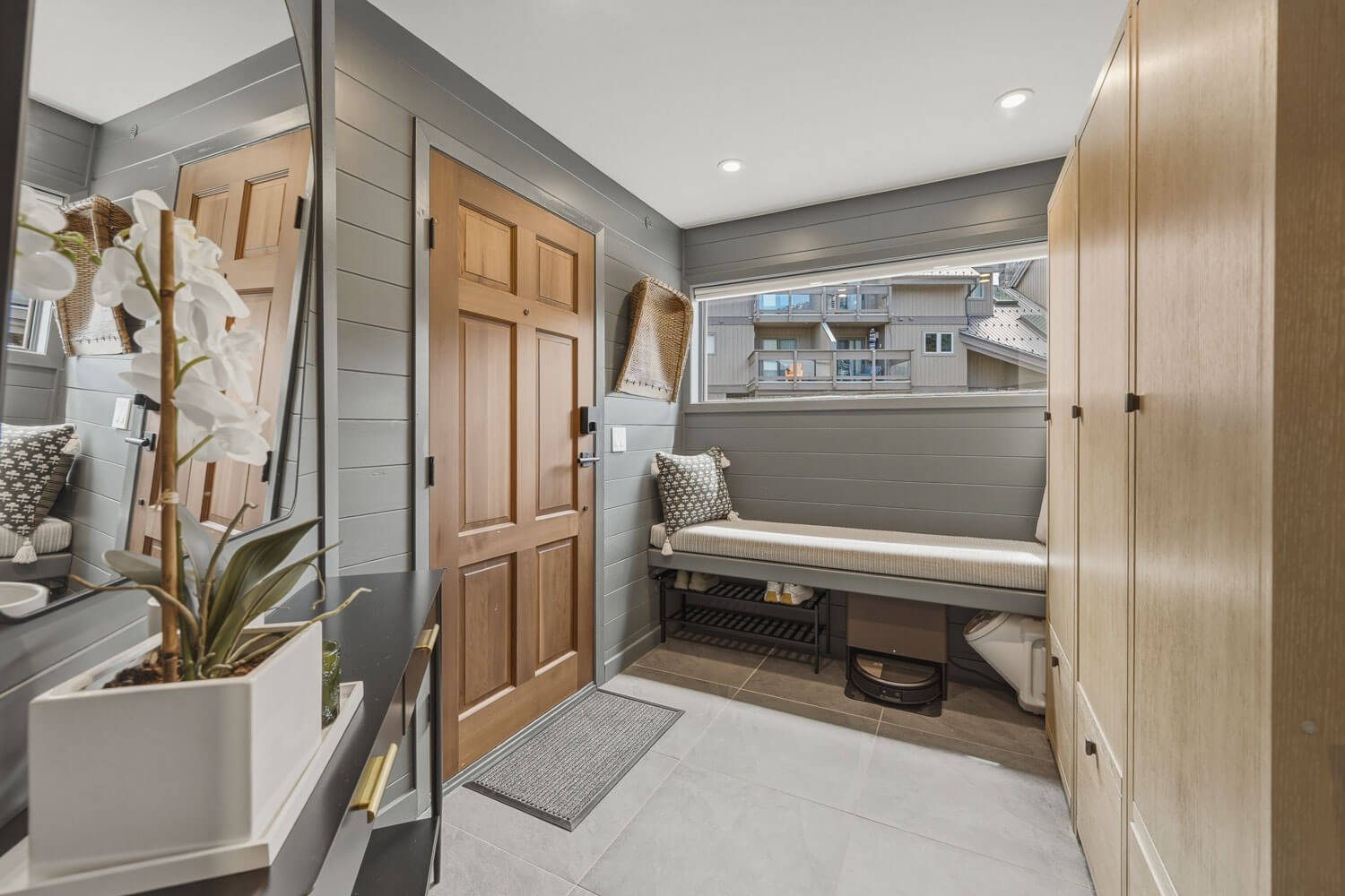 The home offers a large mudroom and generous private storage