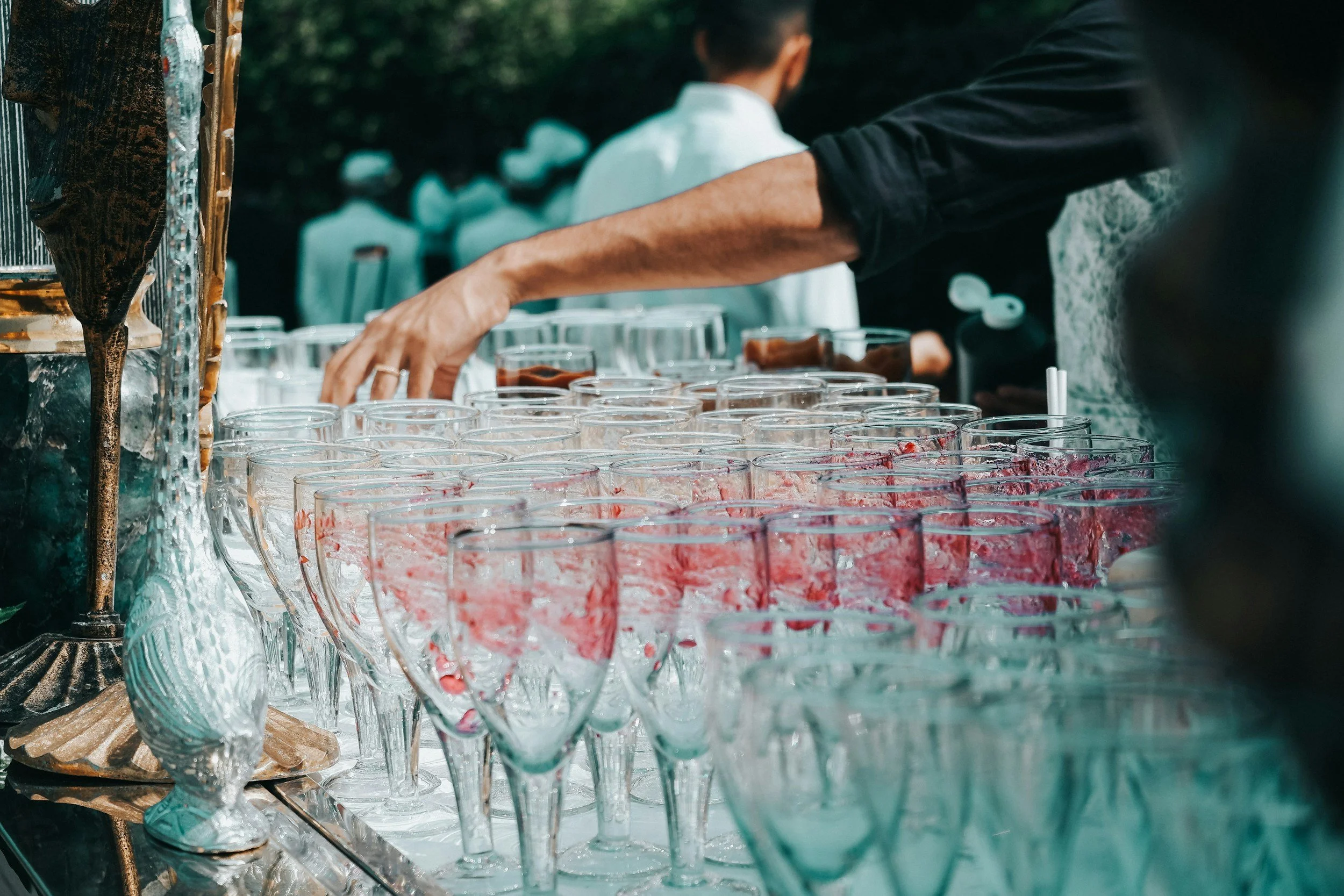 Professional food and beverage team serving guests at a large venue.