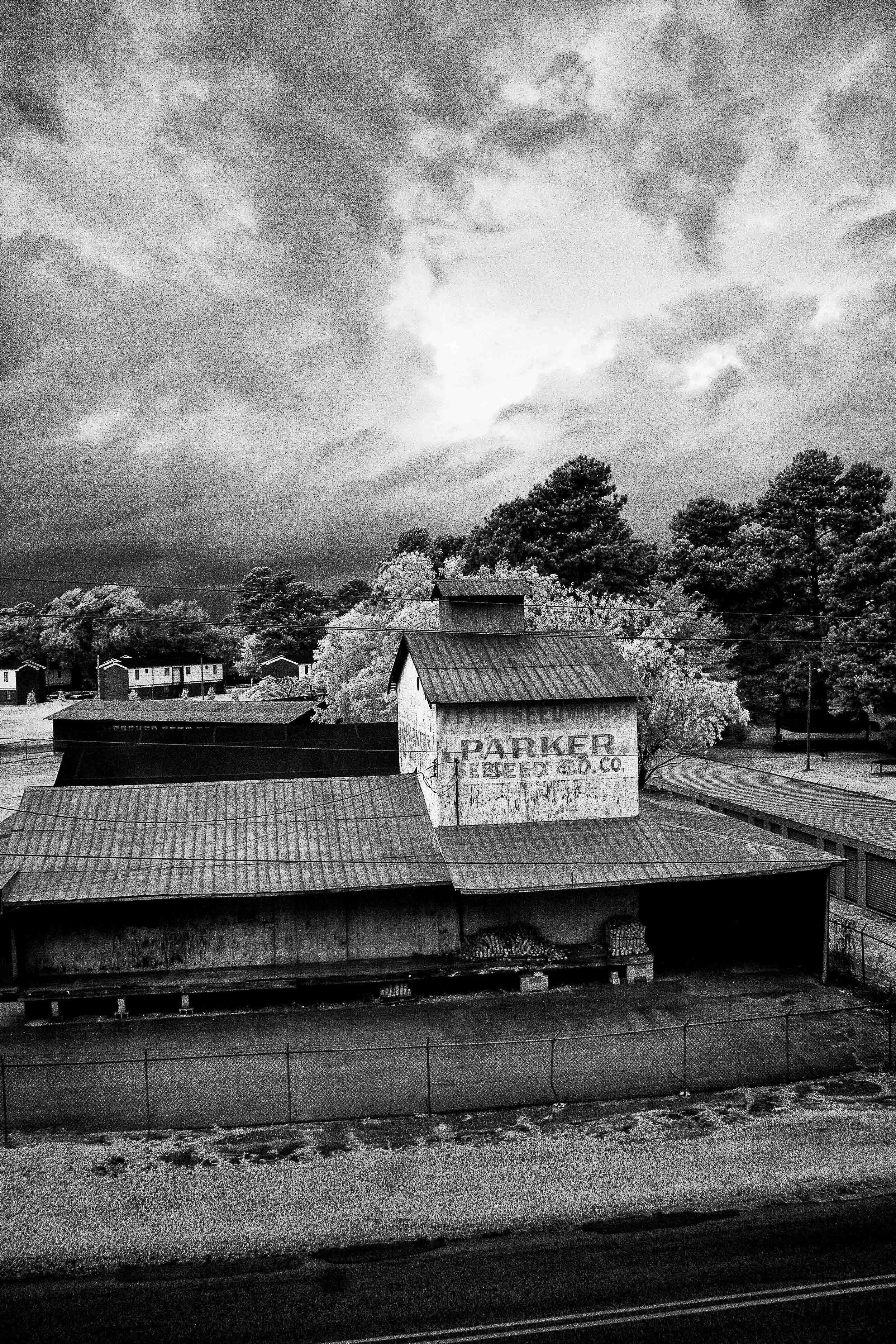 Infrared- "Parker Seed Company" Barn. Silo. Roof. Trees. Clouds. NC