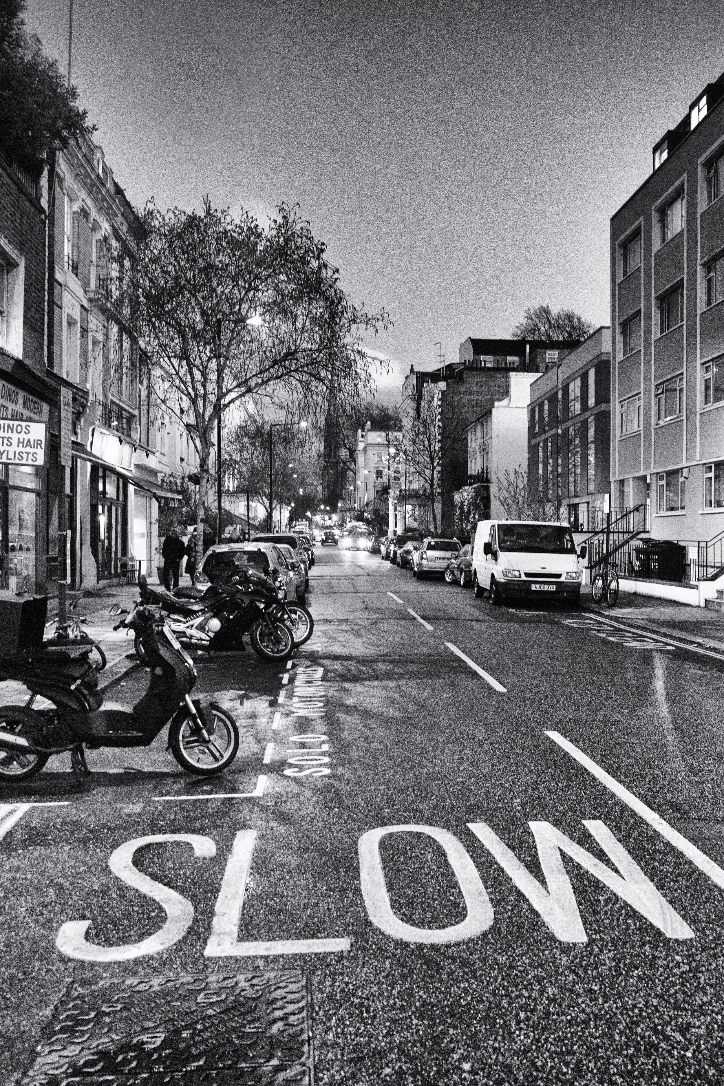 Infrared- "Slow" Street. Cars. Motorcyle. Buildings. Notting Hill, London U.K.
