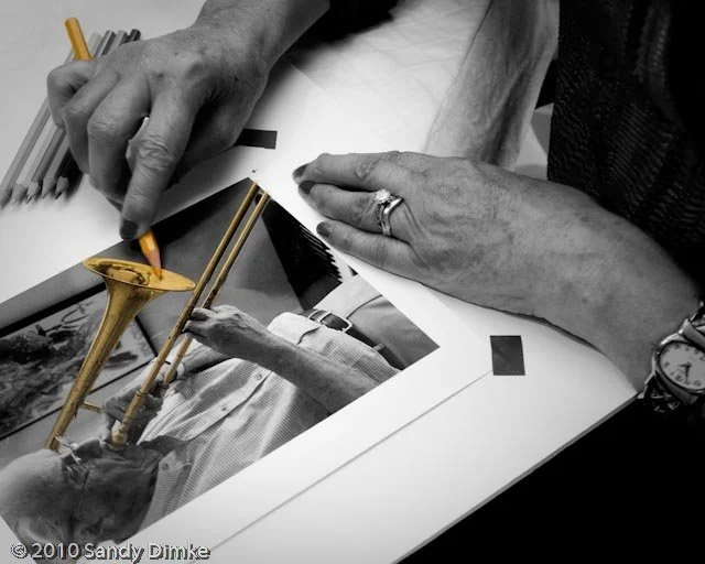Karen M. Peluso's hands painting a print. Photo by Sandy Dimke for Dimke's book titled "Hands Across Beaufort" 2010

www. dimkephoto.com