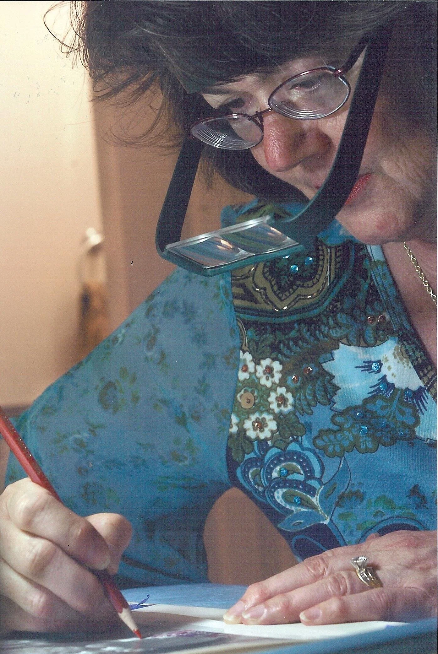 Karen M. Peluso hand-painting/coloring with Marshall's Oil pencils. Photo by Megan Lovett. Purchased from the Beaufort Gazette/Island Packet 2007
