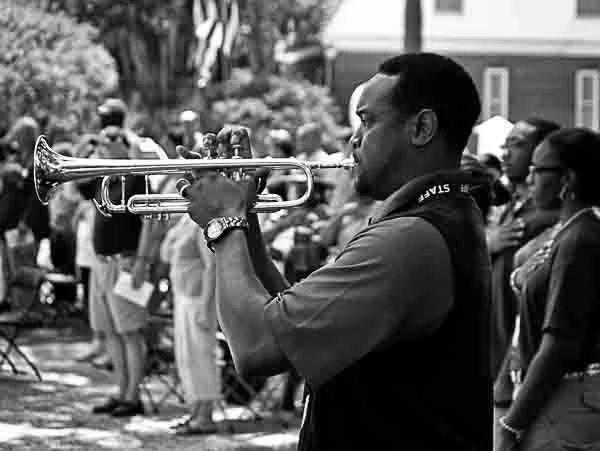 Classic B&W: "In the Key of Respect" Man. Musician. Trumpet. Spectators. Memorial Day. Ceremony. Beaufort National Cemetery, SC 