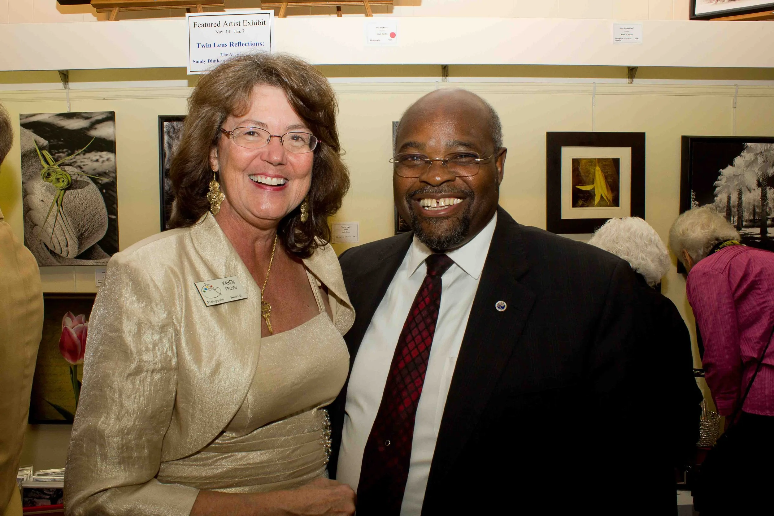 Karen M. Peluso and Rev. Kenneth Hodge (d) at "Twin Lens Reflections" Opening Reception. Beaufort Art Association Gallery. 2011