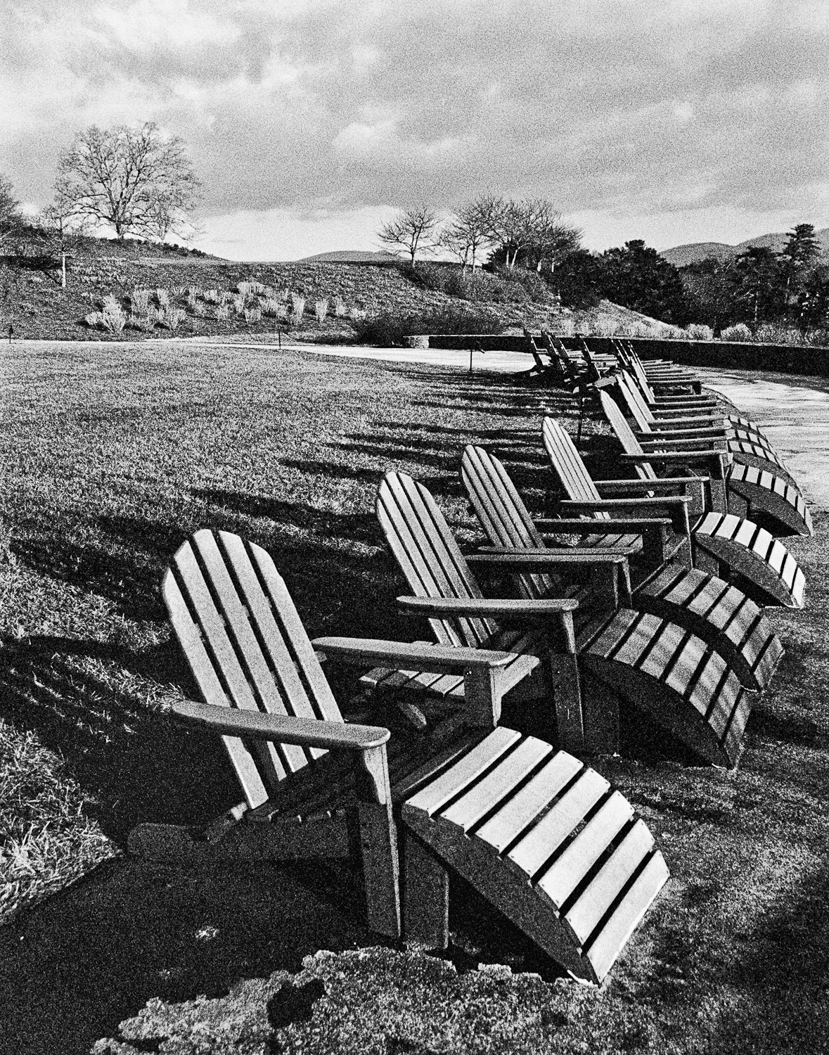 Classic B&W: "Asheville Adirondacks" Wooden Chairs. Lawn. Clouds. Asheville, NC