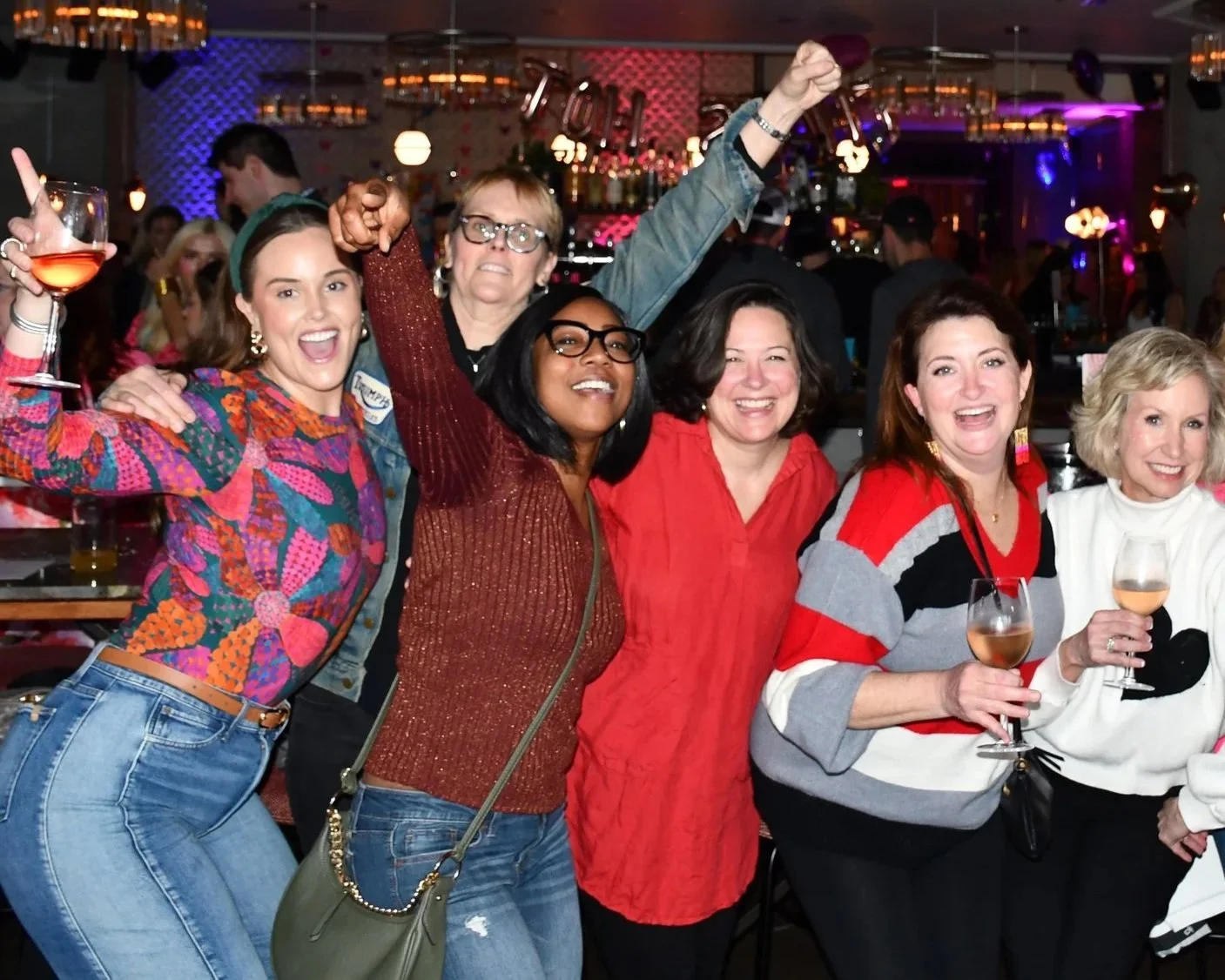 A group of les dames nashville members celebrating galentines day