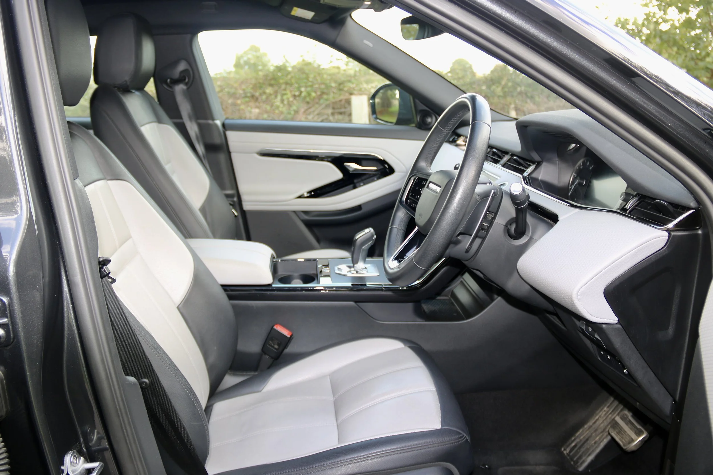 2023 Range Rover Evoque Hybrid R-Dynamic S interior drivers door side view.JPG
