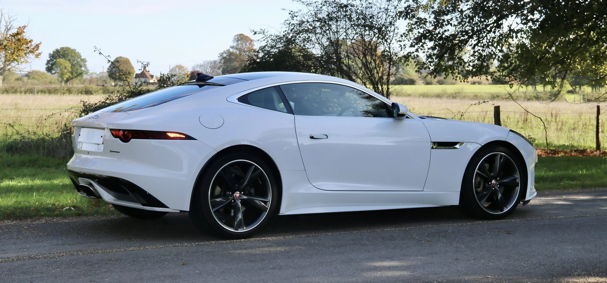 2017 Jaguar F Type I4 R-Dynamic Coupe right side at angle.JPG