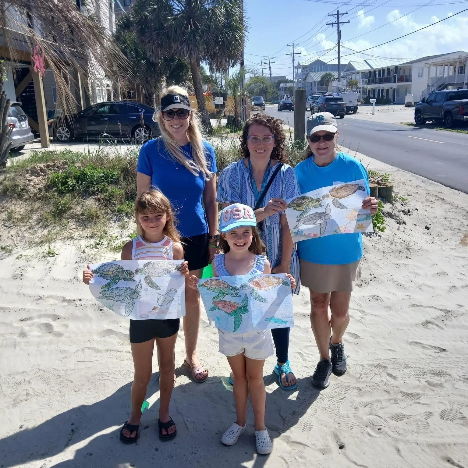 Selwa family and friends volunteering with Keep South Strand Beautiful