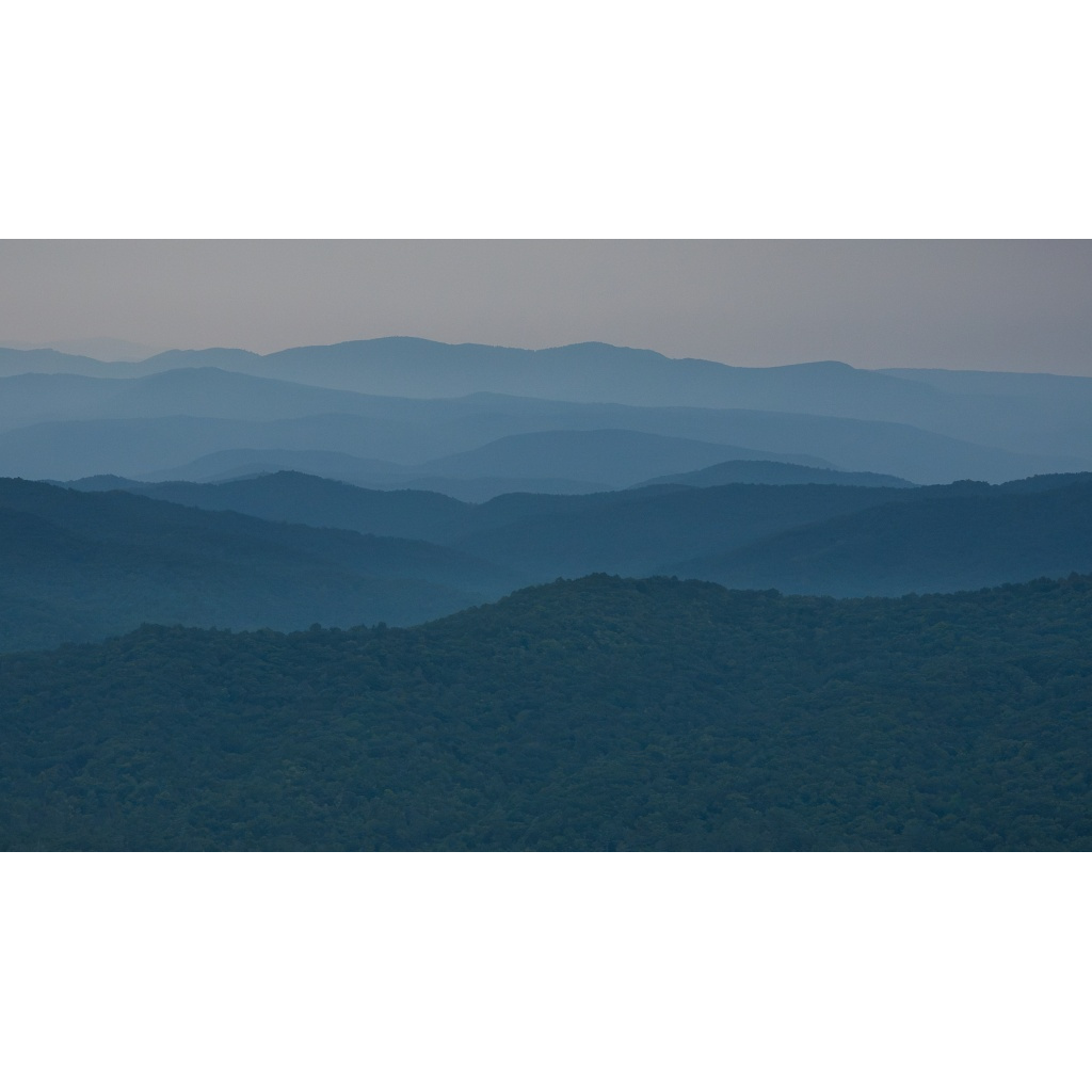 Layered Blue Ridge Mountains fade into the distance in this contemplative landscape photograph about grief, memory, and what remains. Fine art Giclée print by Two Dogs and a Camera.