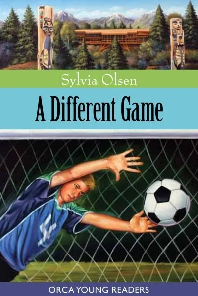 Book cover titled "A Different Game" by Sylvia Olsen, featuring a boy in a soccer jersey reaching for a soccer ball behind a fence, with a mountain and forest background.