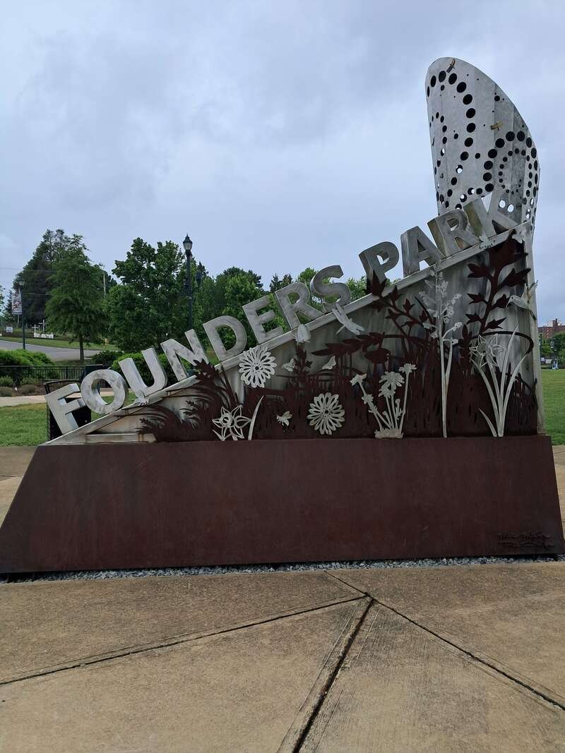 Metal sculpure sign reading Founders Park