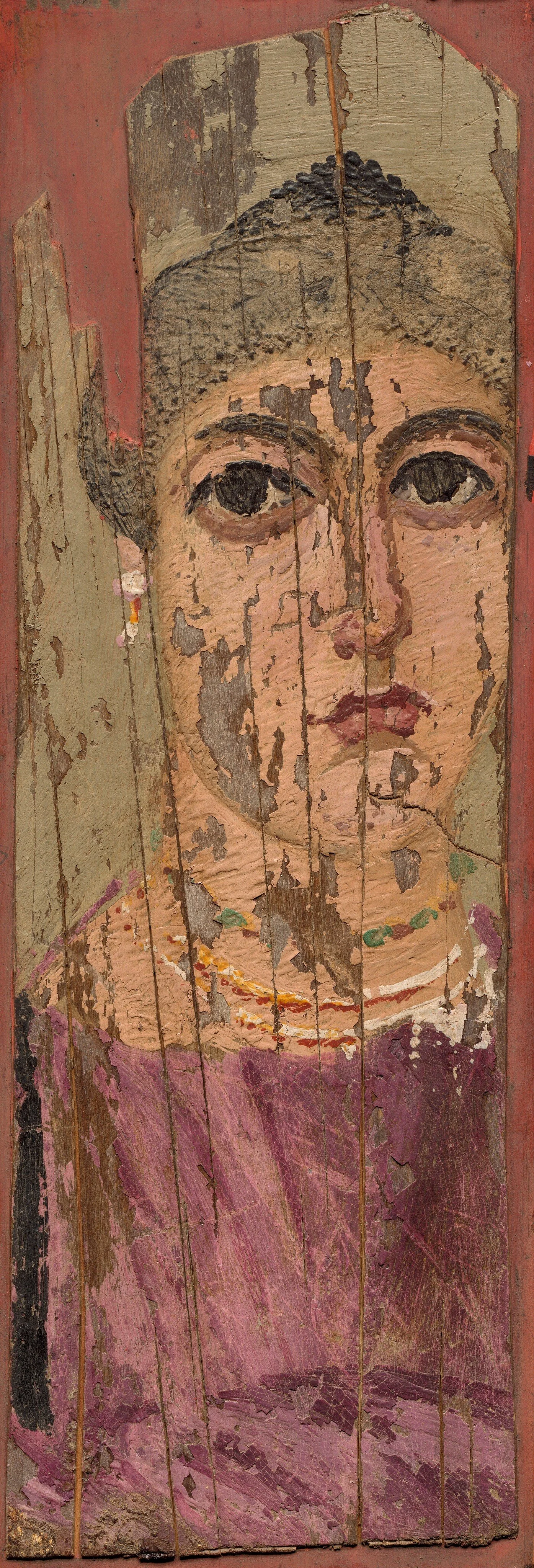 Encaustic painting on wood showing a woman's face
