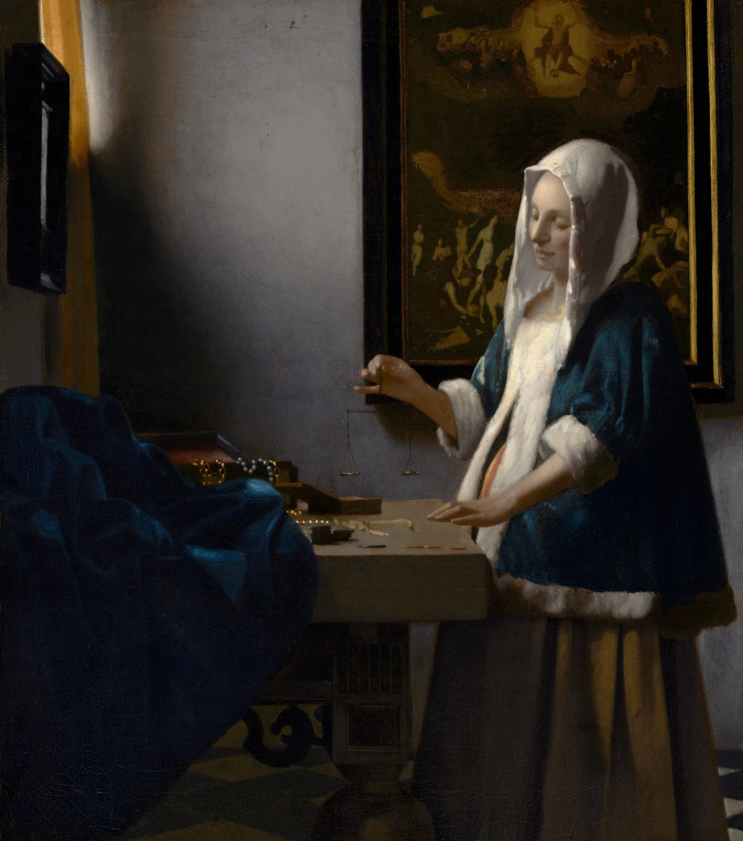 17th century woman works with a scale and pearls