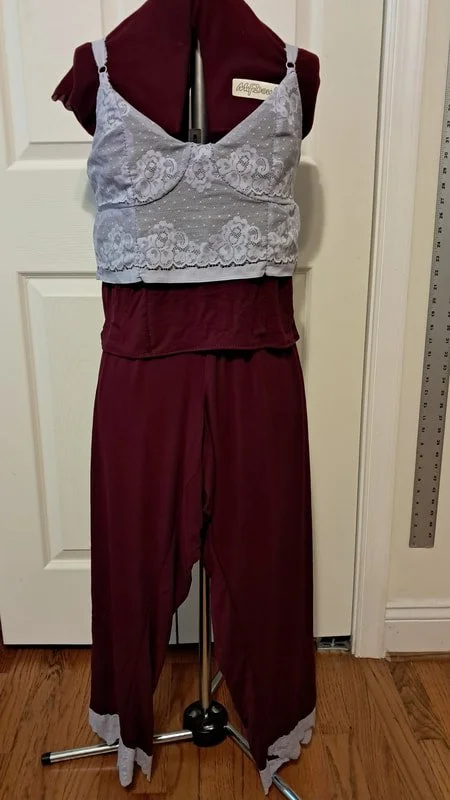 Dark red knit pajama pants and camisol with lavendar lace overly on the top
