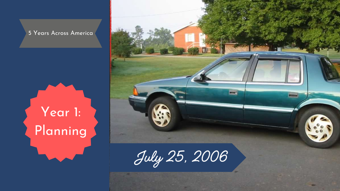 Green 1997 Dodge Spirit parked in a driveway