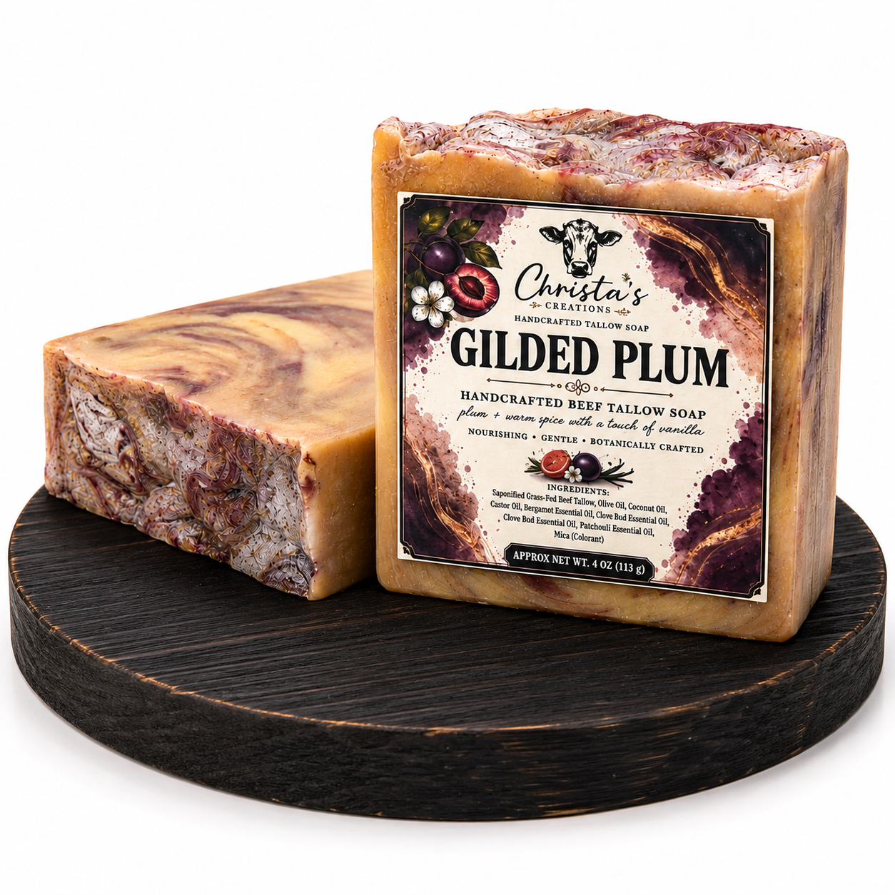 Gilded Plum beef tallow soap displayed with Christa’s Creations plum and gold product label.