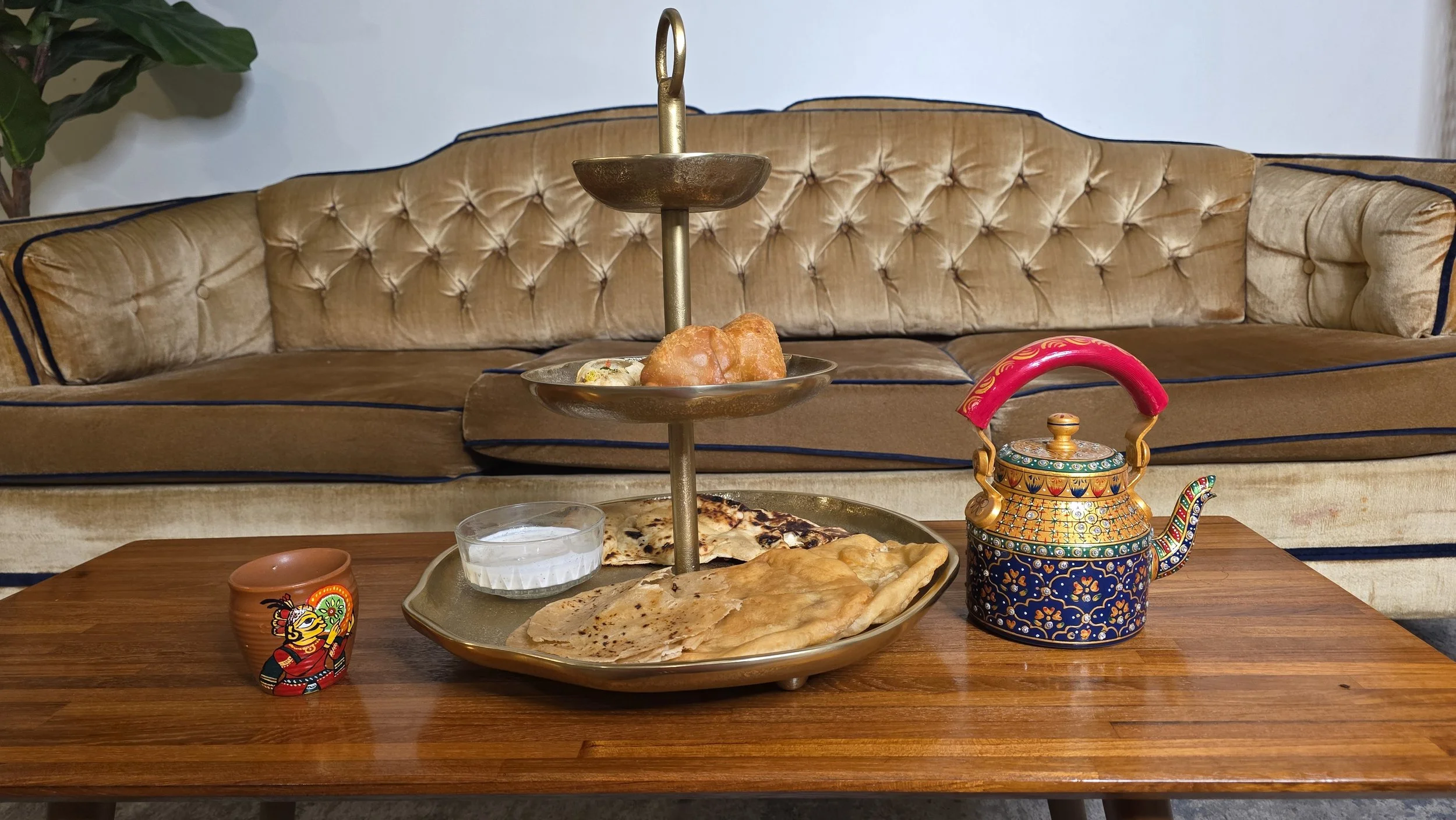 Luxe Tea product photo depicting Indian afternoon tea setup