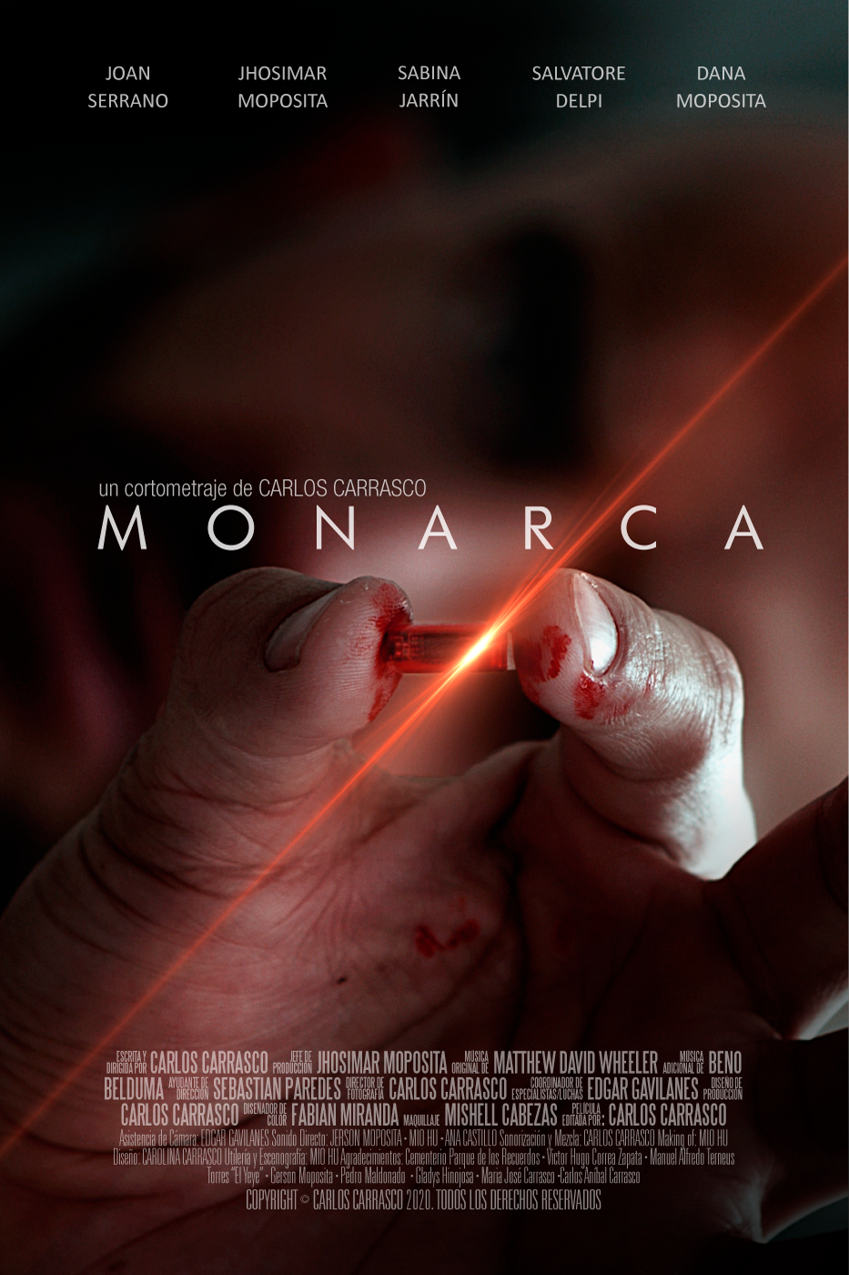 Close-up of a bloodstained hand holding a small blood-test tube, with the title "MONARCA" and credits for a short film by Carlos Carrasco.