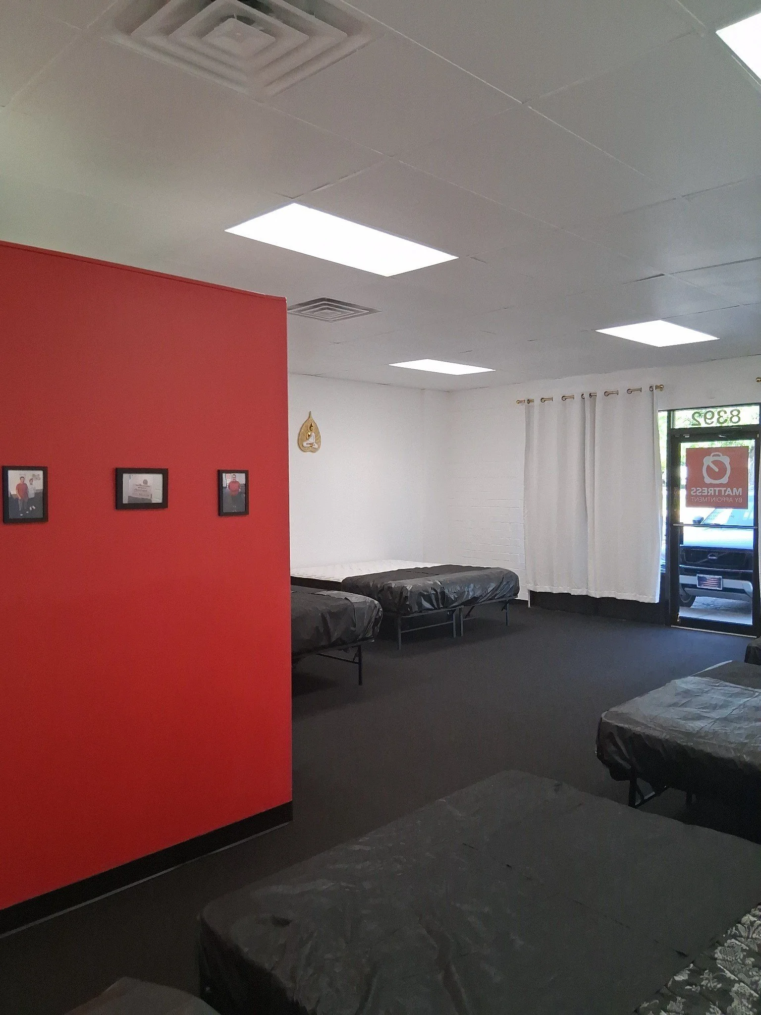 MBA-SLC Appreciation Wall, Buddha, And Front Door Logo On Full Display