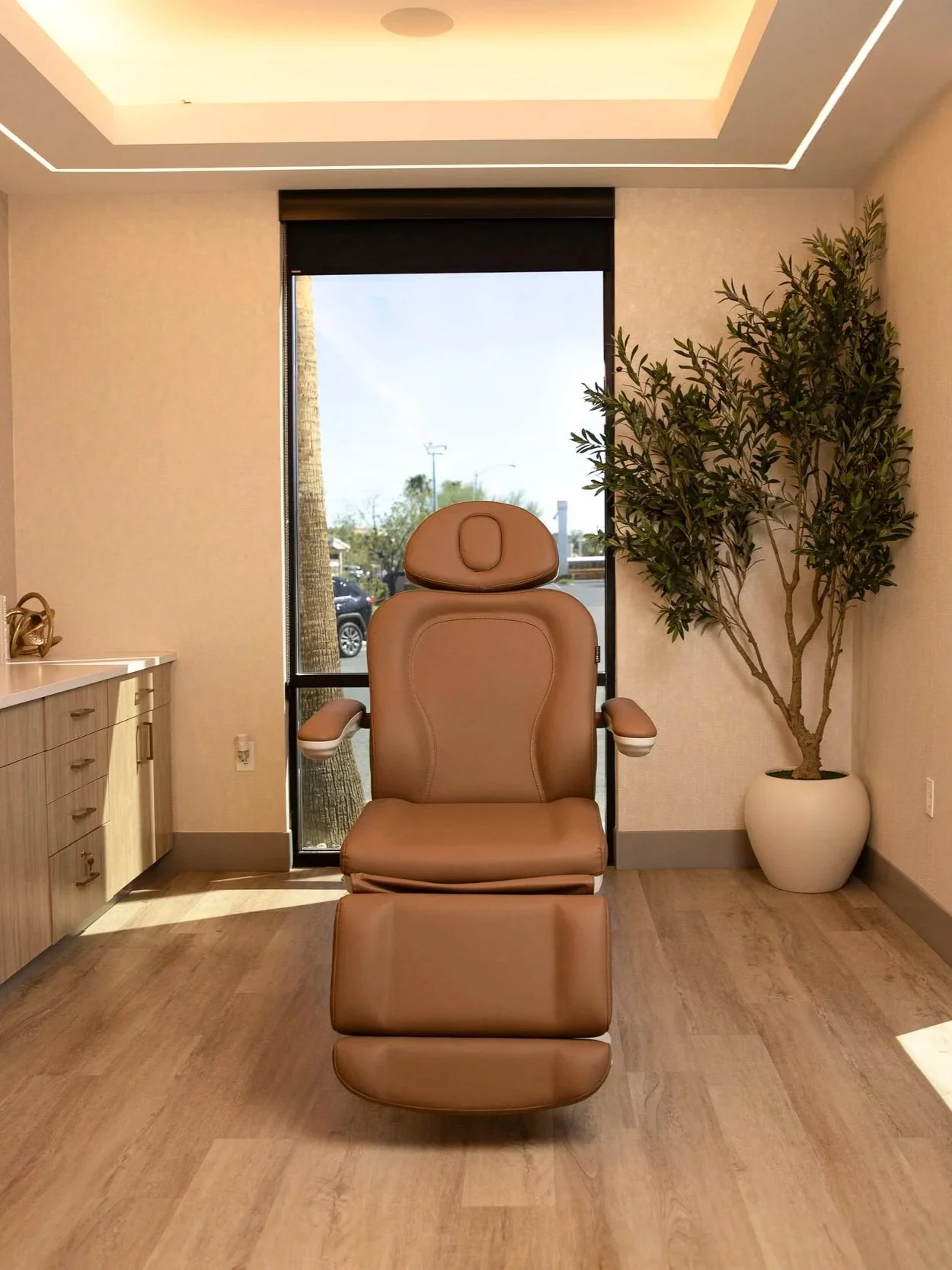 Private treatment room at Estetica Wellness & Medspa in Las Vegas with a modern treatment chair and calming interior