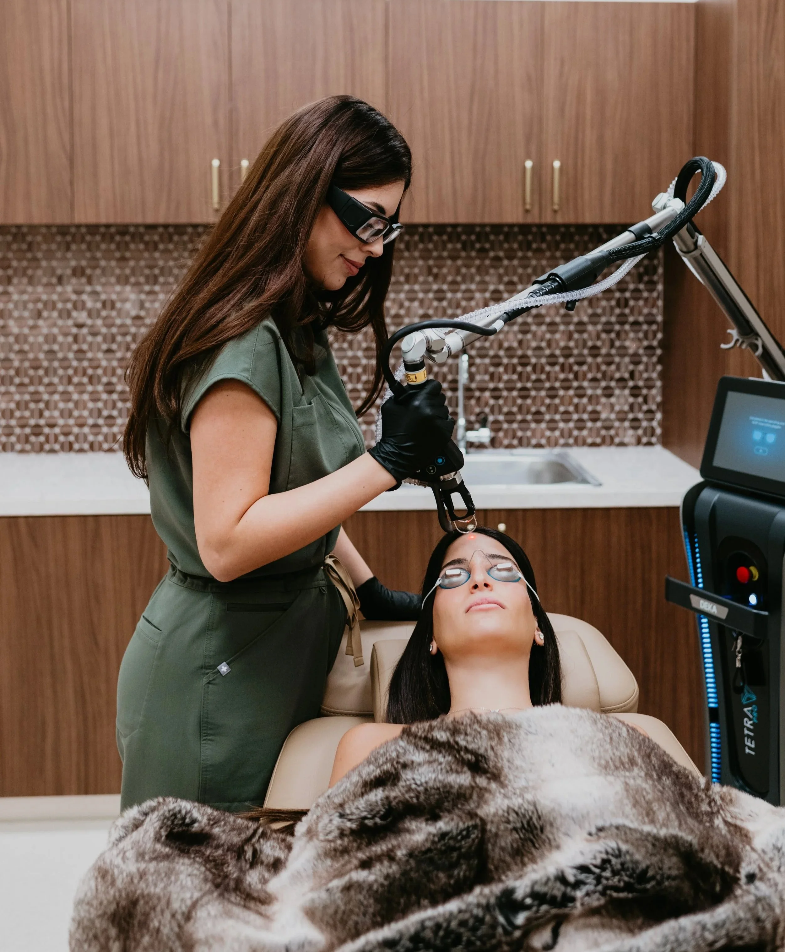 A patient receiving advanced laser skin treatment BBL, Moxi at Estetica Medspa in Las Vegas