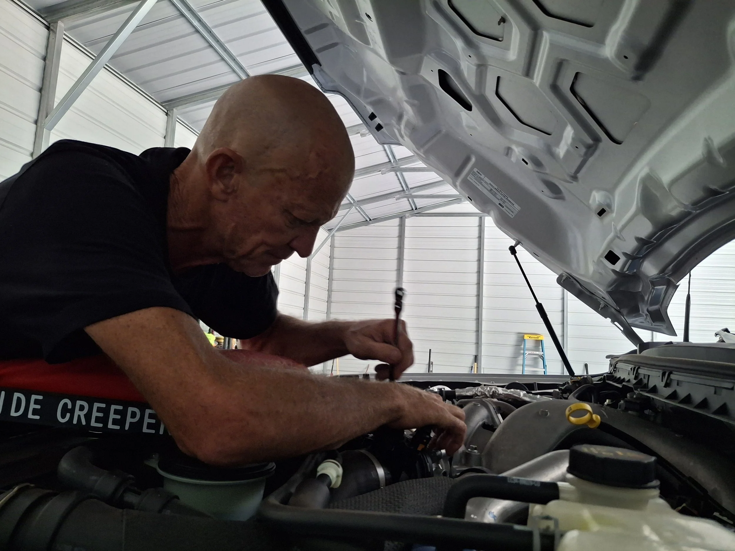 Dave working on a vehicle Image