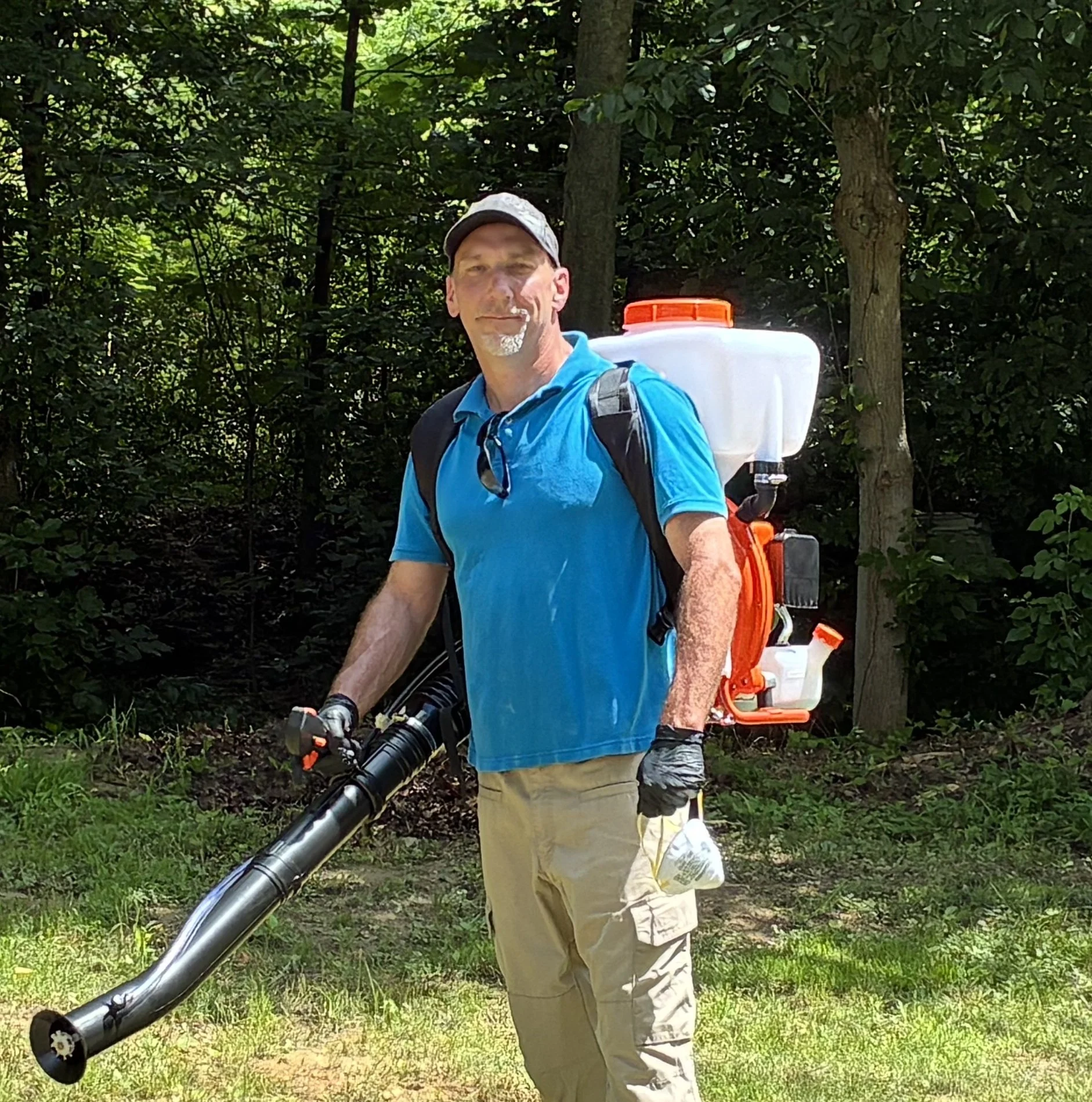 Jon with backpack fogger.jpg