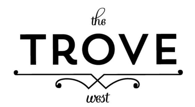 Logo with the text 'the TROVE west' in black, decorative font, with horizontal lines and swirls.