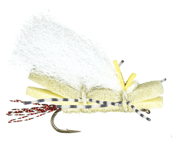 Close-up of a fishing fly with yellow foam body, white dry material, black and white striped legs, and red and black tail, set against a white background.