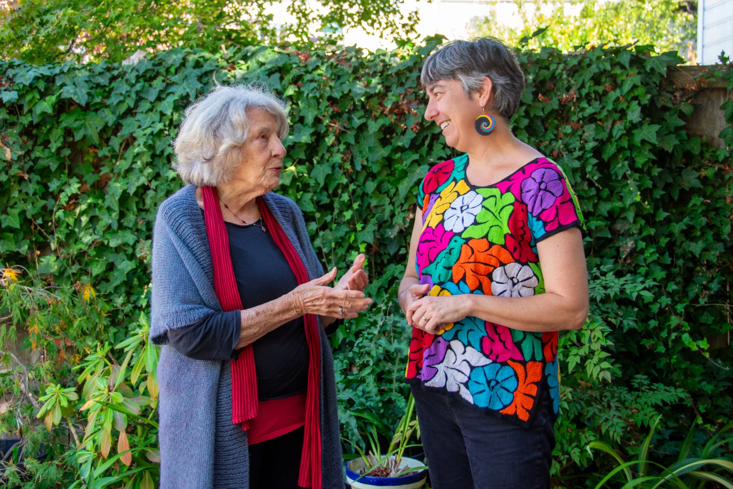 Daria Wrubel talking with neighbors at a community event