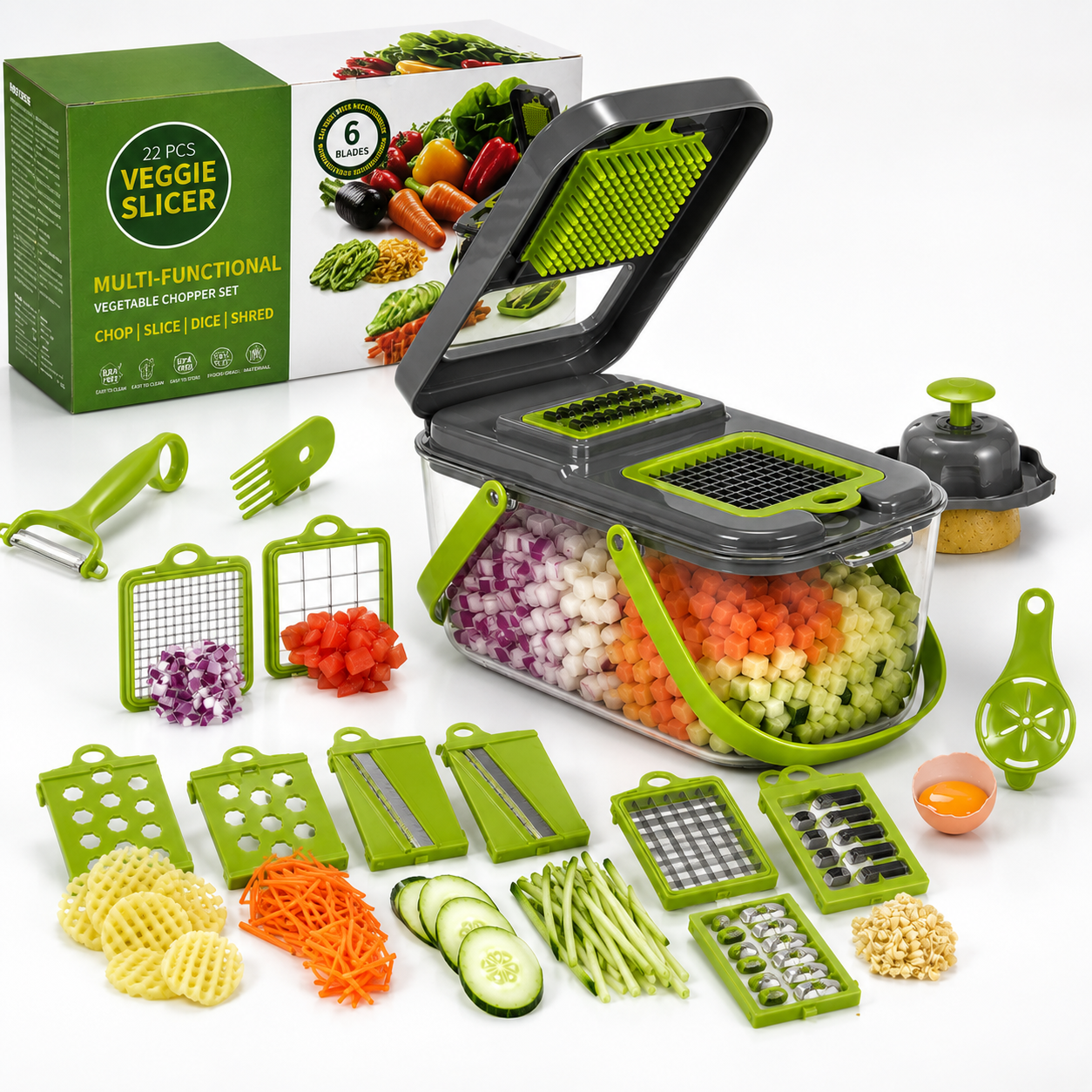 Complete 22-piece vegetable chopper kit with food container, stainless steel blades, knives, scissors, hand guard, cutting boards, and drain basket